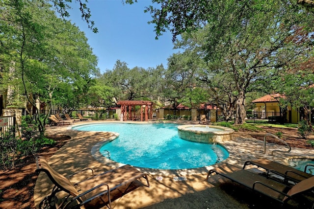 view of swimming pool featuring a patio area, fence, and a pergola