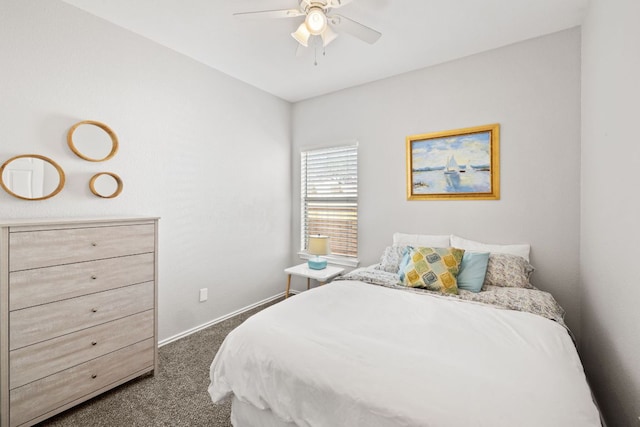 bedroom with dark carpet, a ceiling fan, and baseboards