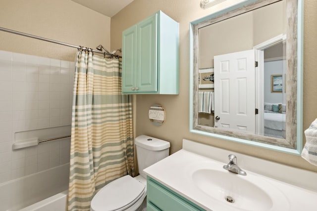 full bathroom featuring shower / tub combo with curtain, vanity, and toilet