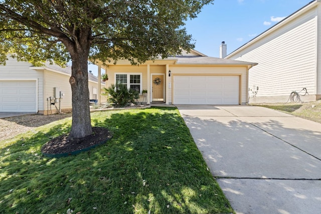 view of front of house with a garage, a chimney, a front lawn, and concrete driveway