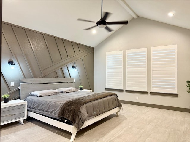 bedroom featuring vaulted ceiling with beams, a ceiling fan, and a decorative wall