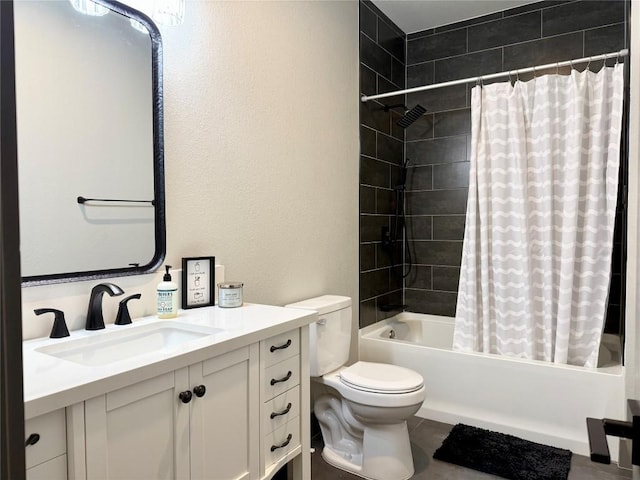 full bath featuring shower / bath combo, vanity, toilet, and tile patterned floors