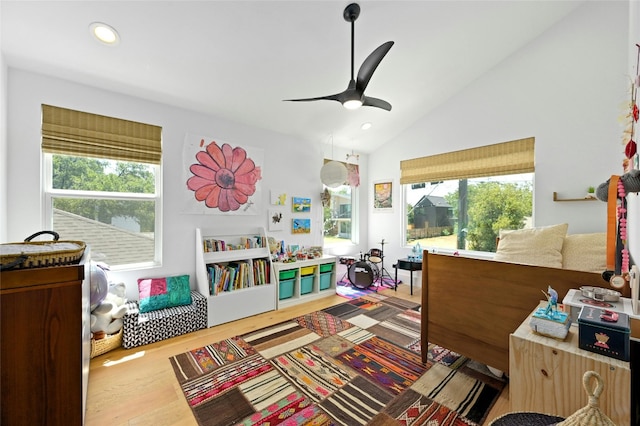 playroom featuring recessed lighting, wood finished floors, ceiling fan, and vaulted ceiling