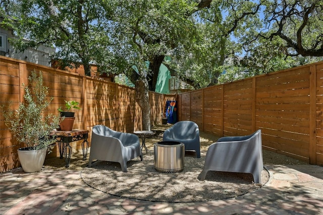 view of patio / terrace with grilling area and a fenced backyard