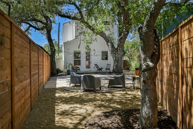 exterior space featuring a patio and a fenced backyard