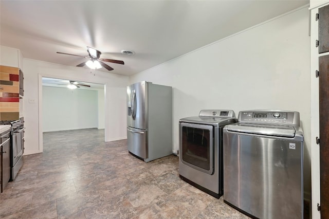 10309 Wommack Rd, Austin, TX 78748 - washroom with ceiling fan, washer and clothes dryer, and stone finish flooring