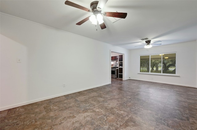 unfurnished room with visible vents, ceiling fan, and baseboards