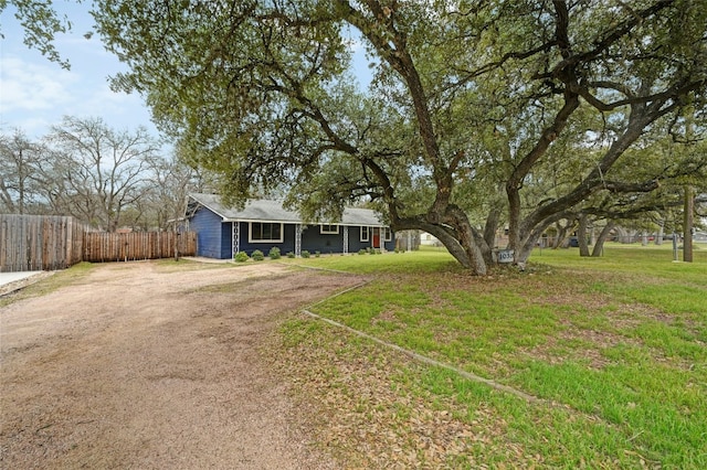 10309 Wommack Rd, Austin, TX 78748 - view of front facade featuring driveway