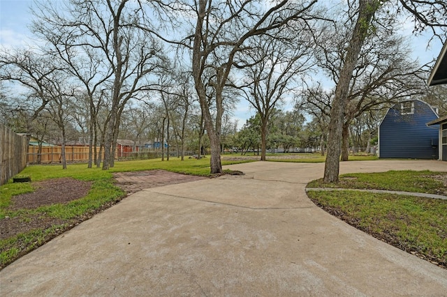 10309 Wommack Rd, Austin, TX 78748 - view of yard with concrete driveway