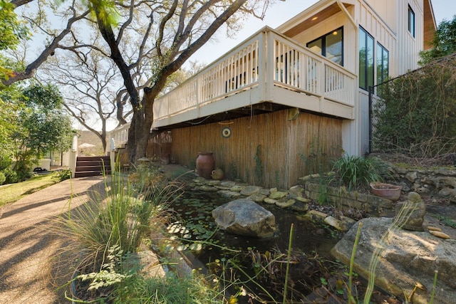 view of home's exterior featuring a deck