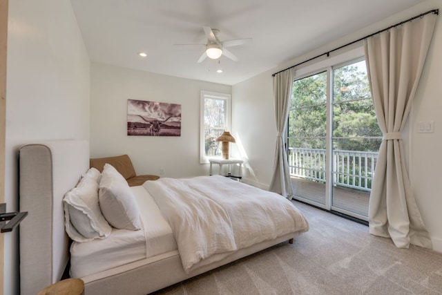 carpeted bedroom featuring access to exterior, ceiling fan, and recessed lighting