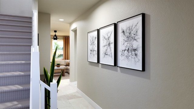 corridor featuring recessed lighting and baseboards