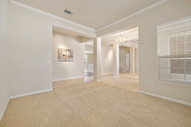 carpeted spare room featuring baseboards, visible vents, and crown molding