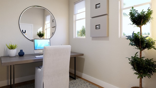 office space featuring wood finished floors and baseboards