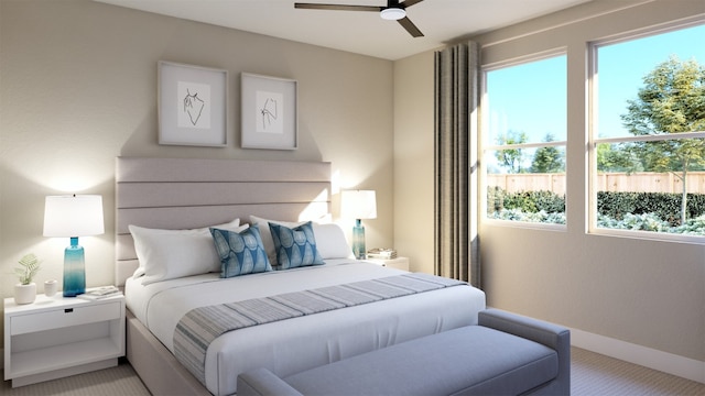 bedroom featuring a ceiling fan, light carpet, and baseboards