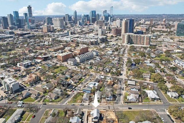 birds eye view of property featuring a view of city