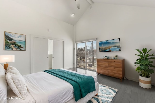 bedroom with access to exterior, beamed ceiling, hardwood / wood-style flooring, and high vaulted ceiling