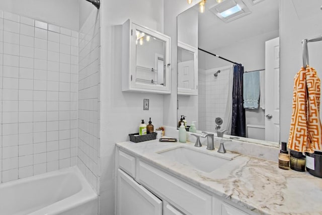 full bath featuring shower / bath combo and vanity