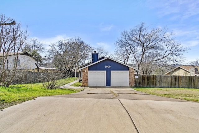 garage featuring fence