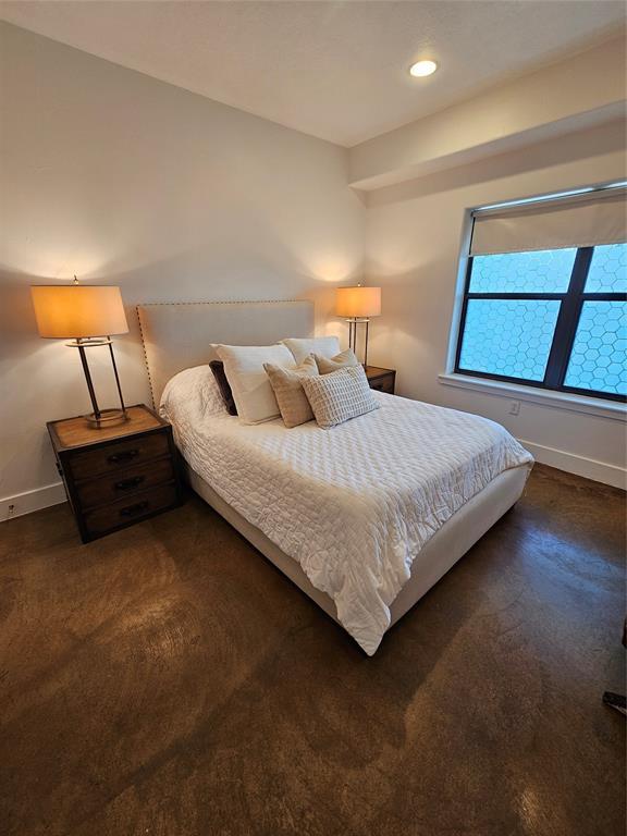 bedroom featuring recessed lighting and baseboards