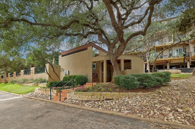 view of front of home featuring stucco siding