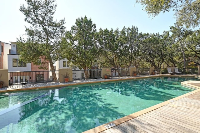 community pool with fence