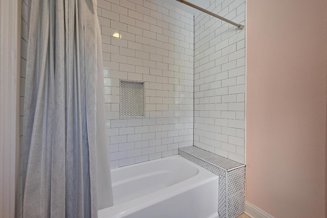 full bathroom featuring shower / bathtub combination with curtain