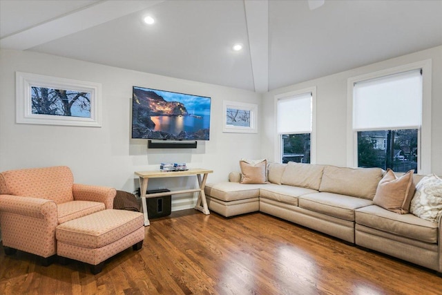 living area with lofted ceiling, wood finished floors, and recessed lighting