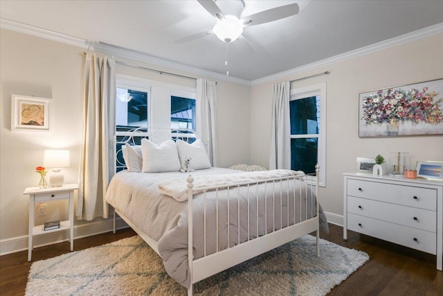 bedroom featuring baseboards, ornamental molding, ceiling fan, and dark wood-style flooring