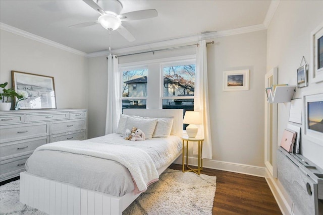 bedroom featuring ceiling fan, ornamental molding, dark wood-style flooring, and baseboards