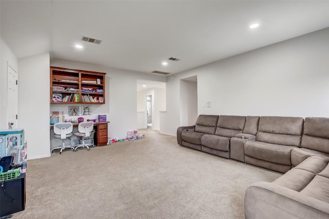 carpeted living room with recessed lighting and visible vents