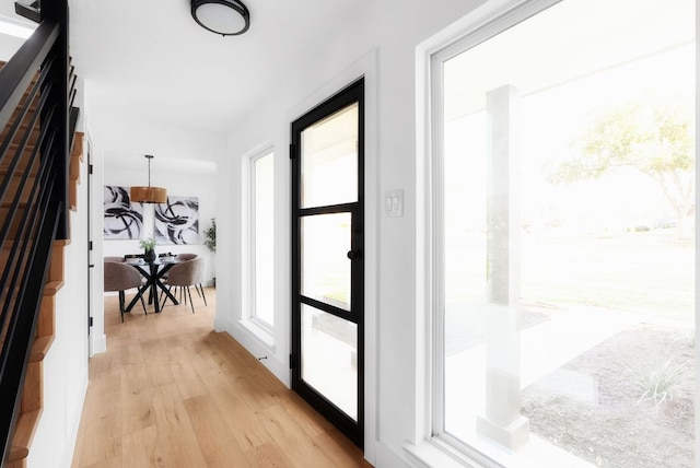 doorway featuring light wood-style floors