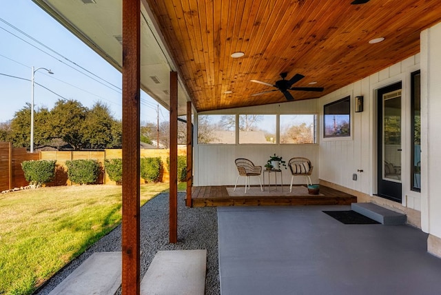 view of patio / terrace featuring fence