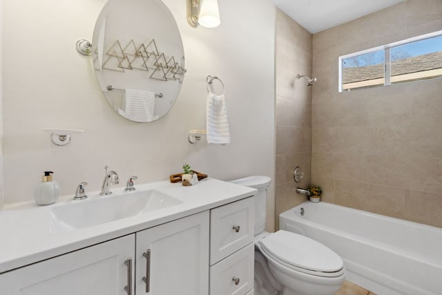 full bath with toilet, vanity, and tub / shower combination