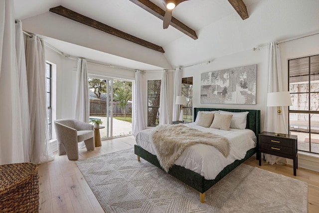 bedroom with light wood-type flooring, vaulted ceiling with beams, access to outside, and a ceiling fan