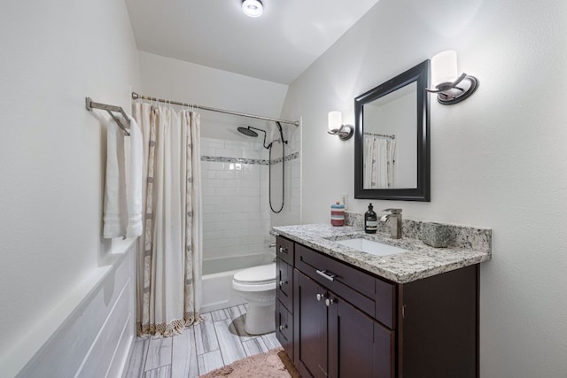 bathroom featuring toilet, vanity, and shower / bathtub combination with curtain