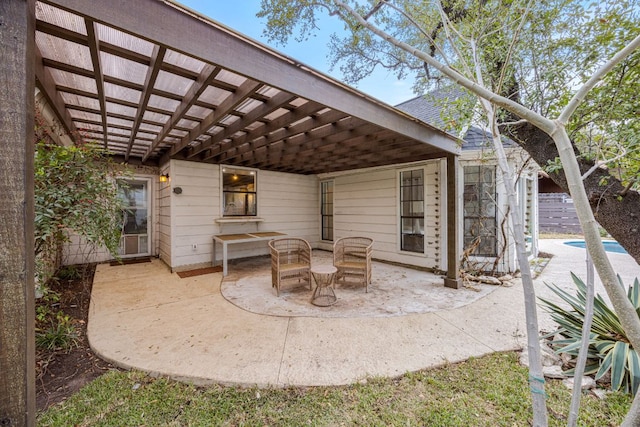 view of patio featuring a pergola