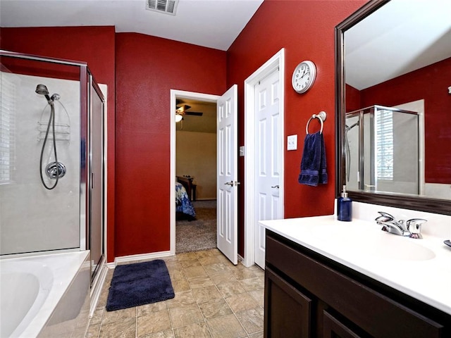 ensuite bathroom featuring a bath, a stall shower, visible vents, and ensuite bathroom