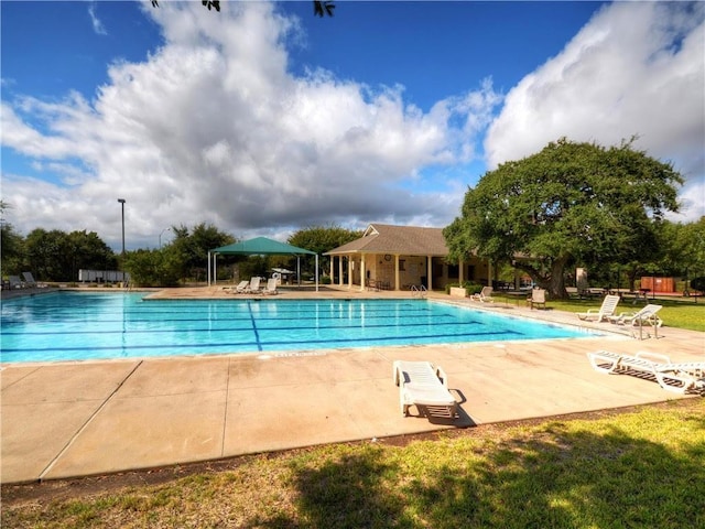 pool featuring a patio