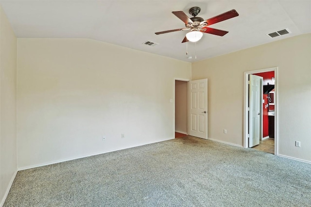 interior space with visible vents, ceiling fan, baseboards, and lofted ceiling