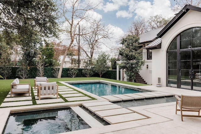 view of swimming pool featuring stairs, a patio, a fenced backyard, and a fenced in pool