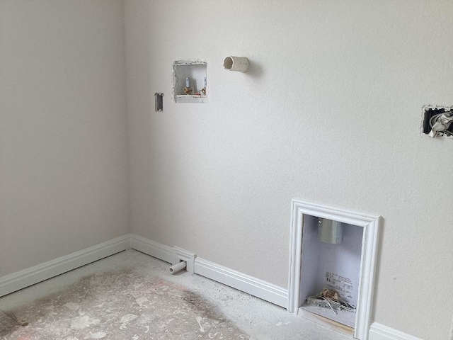 laundry area featuring washer hookup, laundry area, and baseboards