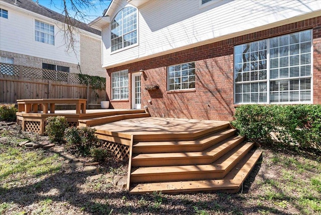 wooden deck featuring fence