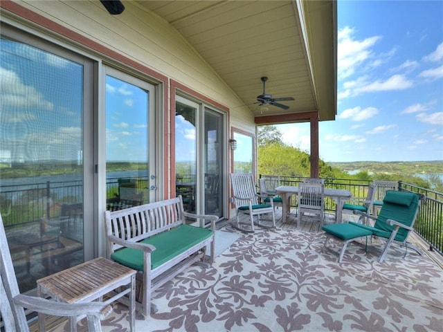 view of patio with ceiling fan and outdoor dining space