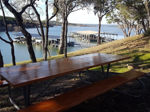 exterior space with a water view