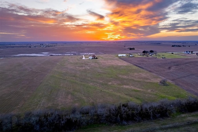 aerial view at dusk with a rural view