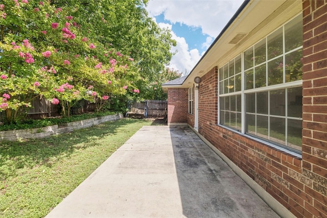 exterior space featuring a fenced backyard