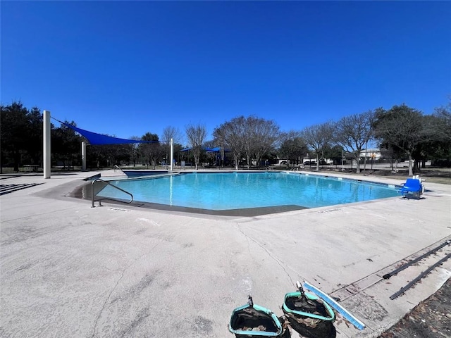 pool featuring a patio area