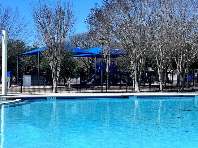 pool featuring fence