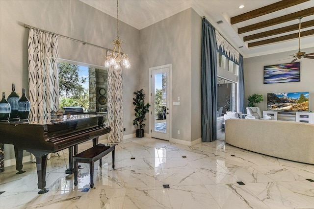 entryway featuring a towering ceiling, marble finish floor, baseboards, and beam ceiling